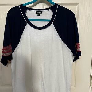Torrid White tee with red and blue sleeves